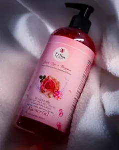 Erika British Rose & Frangipani Shower Gel bottle with floral ingredients