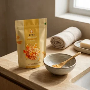 Applying Erika Orange Peel Powder face pack for skin brightening